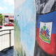 A Haitian flag decorates a wall in Little Haiti, a neighborhood that sits approximately 10 feet above sea level. (Ashley Velez/The Root)